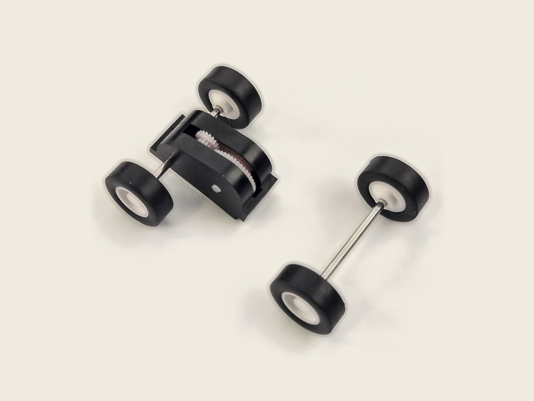 Scamp pull-back motor with its matching 16 mm front wheel-and-axle set